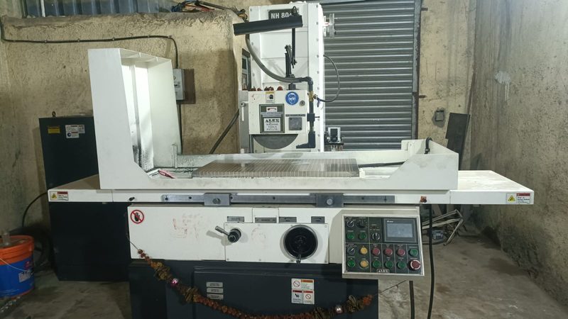 ALEX NH 8040 surface grinder, magnetic chuck loaded and ready.